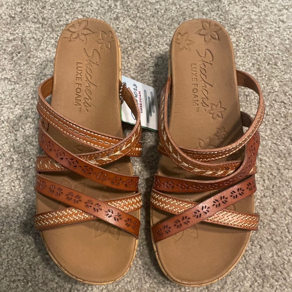 Brand new Skechers wedges size 7.